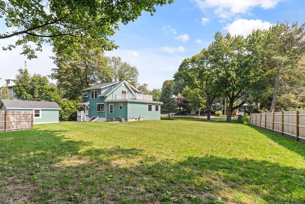 58 Maple Road Melrose, MA 02176 - Photo 32 of 34 a front view of house with yard and trees