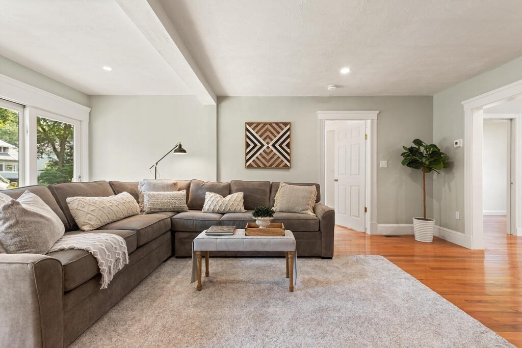 58 Maple Road Melrose, MA 02176 - Photo 6 of 34 a living room with furniture and a large window