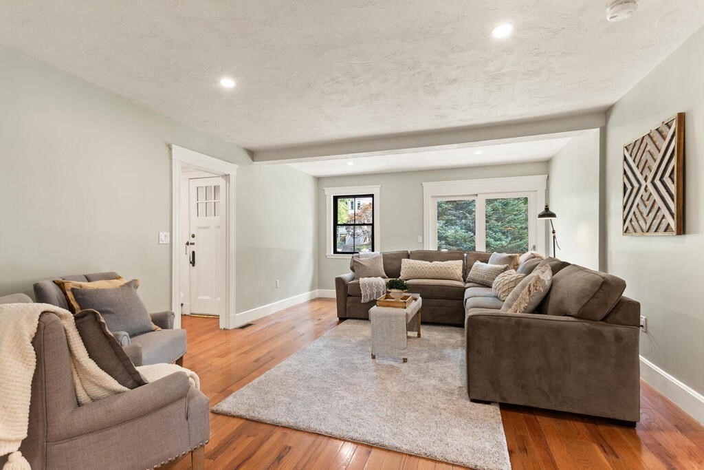 58 Maple Road Melrose, MA 02176 - Photo 7 of 34 a living room with furniture and a large window