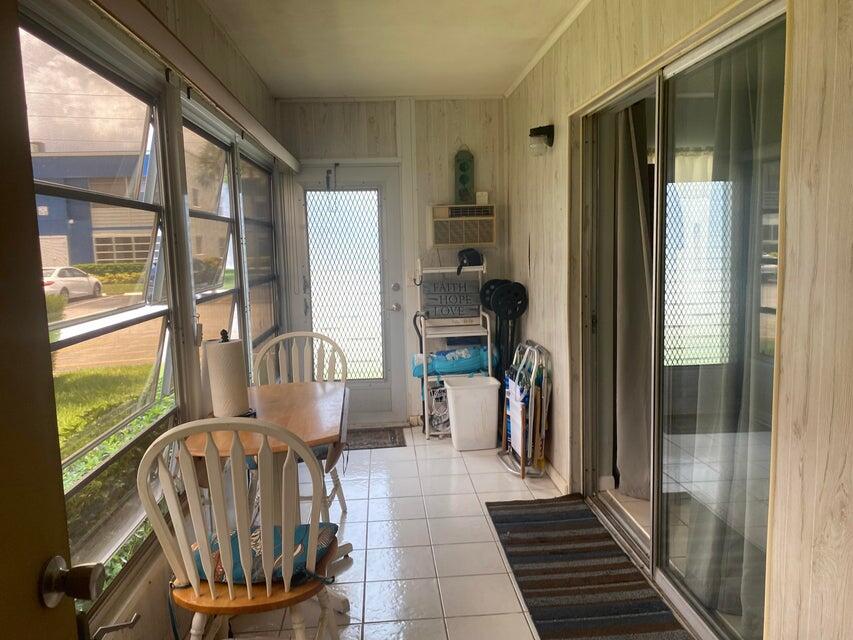 542 Normandy Lane Delray Beach, FL 33484 - Photo 12 of 32 a view of a balcony with furniture