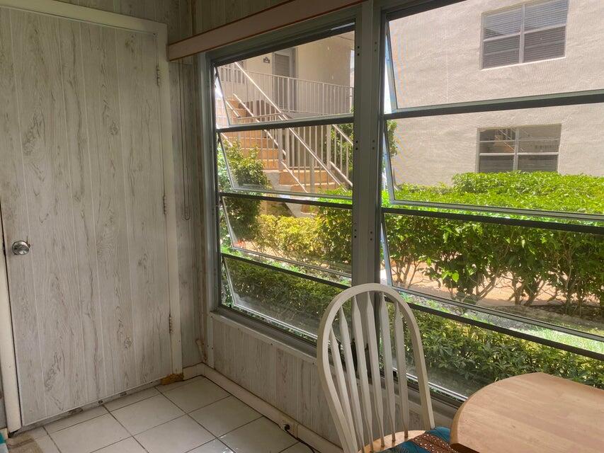 542 Normandy Lane Delray Beach, FL 33484 - Photo 13 of 32 a view of a porch