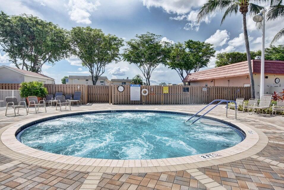 542 Normandy Lane Delray Beach, FL 33484 - Photo 31 of 32 a view of outdoor space yard and patio