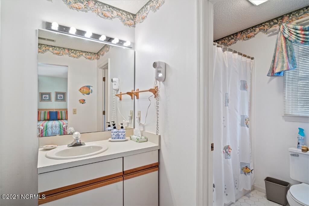 250 Clubhouse Road, Unit A Sunset Beach, NC 28468 - Photo 14 of 32 Bathroom 1