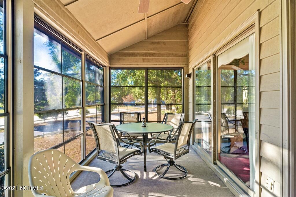 250 Clubhouse Road, Unit A Sunset Beach, NC 28468 - Photo 21 of 32 Screened Porch