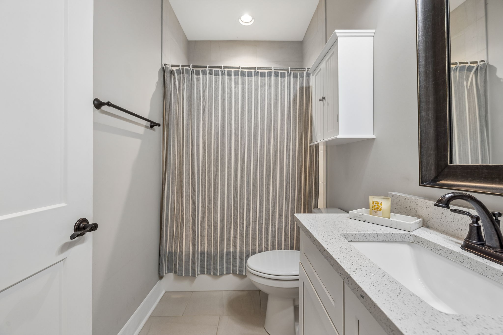 20 Sycamore Ridge West Burns, TN 37029 - Photo 21 of 38 a bathroom with a sink toilet and shower