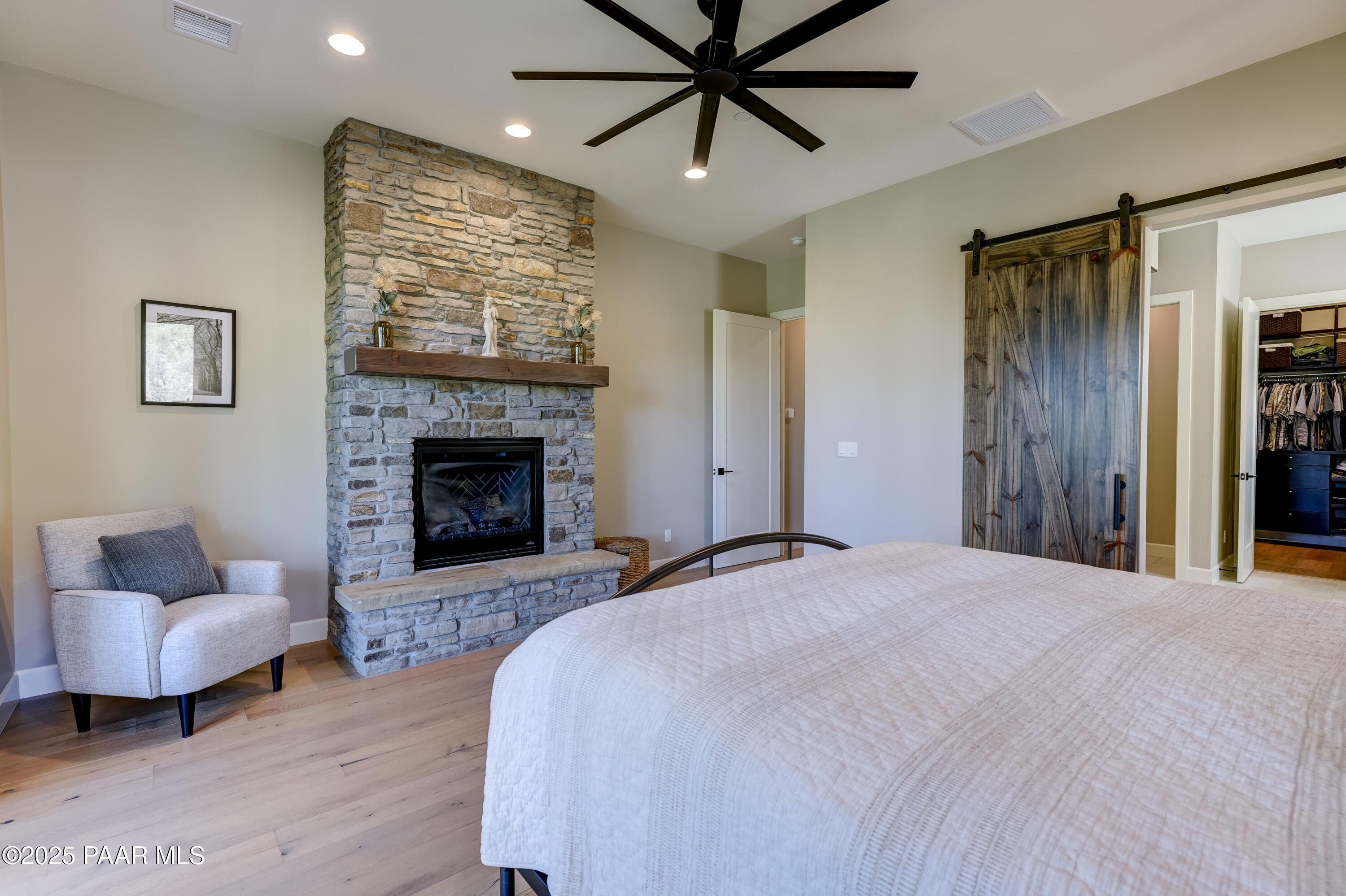 1145 High Valley Ranch Road Prescott, AZ 86303 - Photo 23 of 57 Primary Bedroom with Fireplace