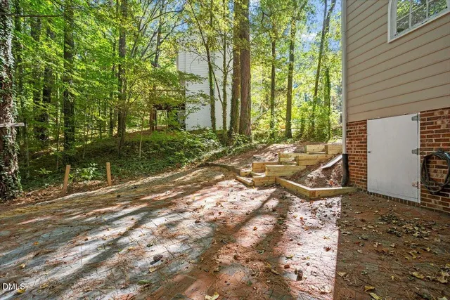 a view of backyard with green space