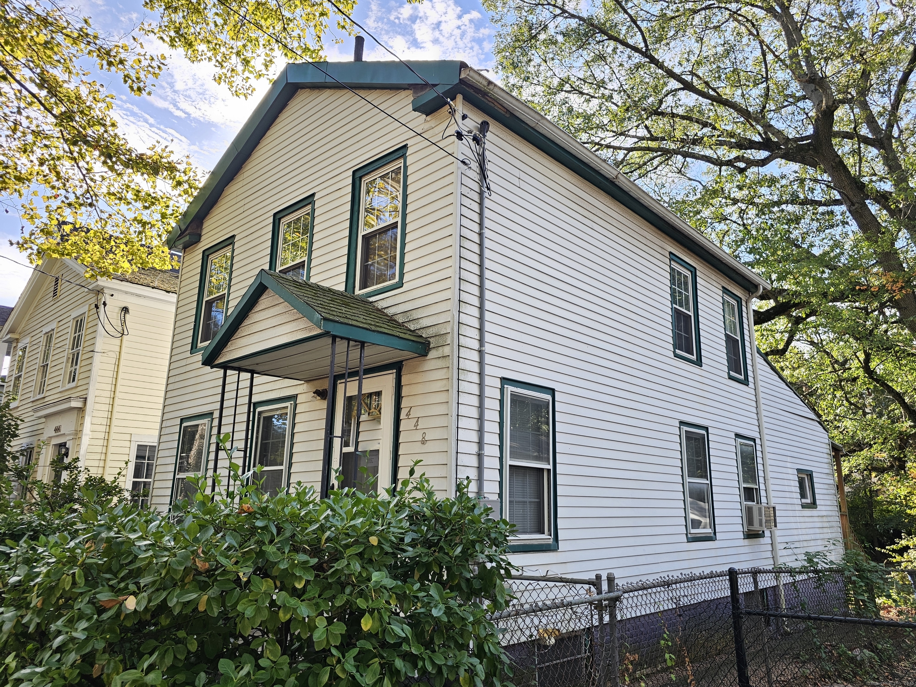 a front view of a house with porch