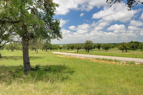 a view of an outdoor space with a lake view
