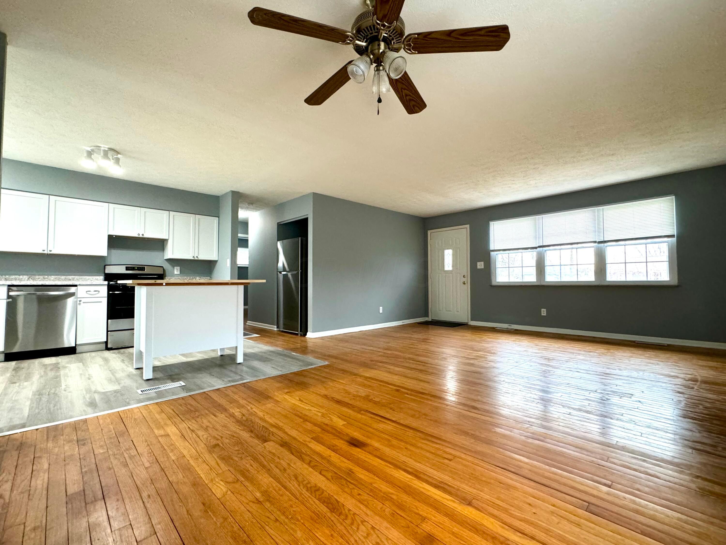 609 Raleigh Drive Columbus, OH 43228 - Photo 20 of 33 Additional view of living area, dining space, and kitchen