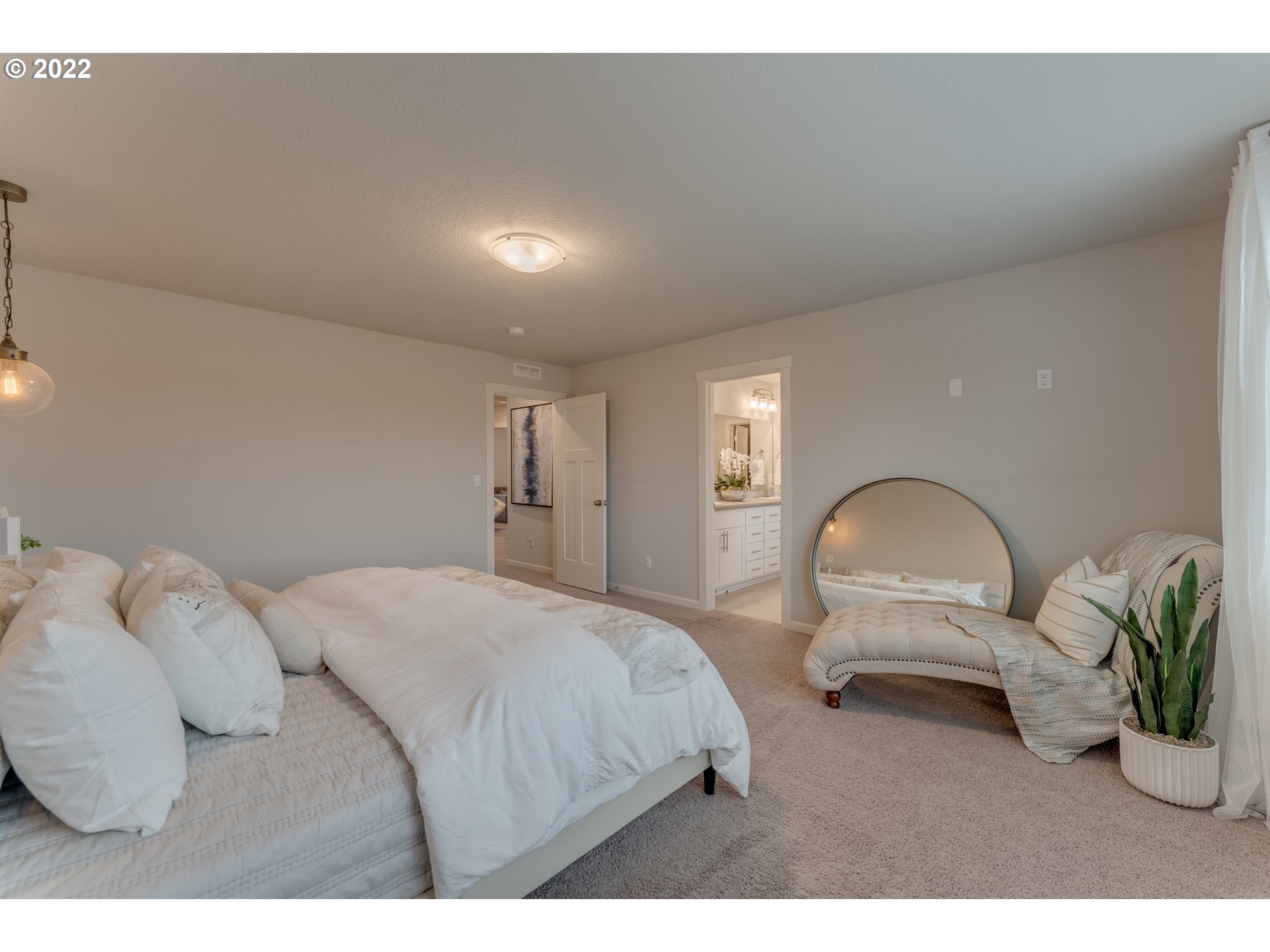 13305 Northeast 114th Way Brush Prairie, WA 98606 - Photo 20 of 31 a bedroom with a bed mirror and dresser