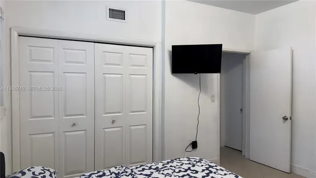 a view of a bedroom from hallway