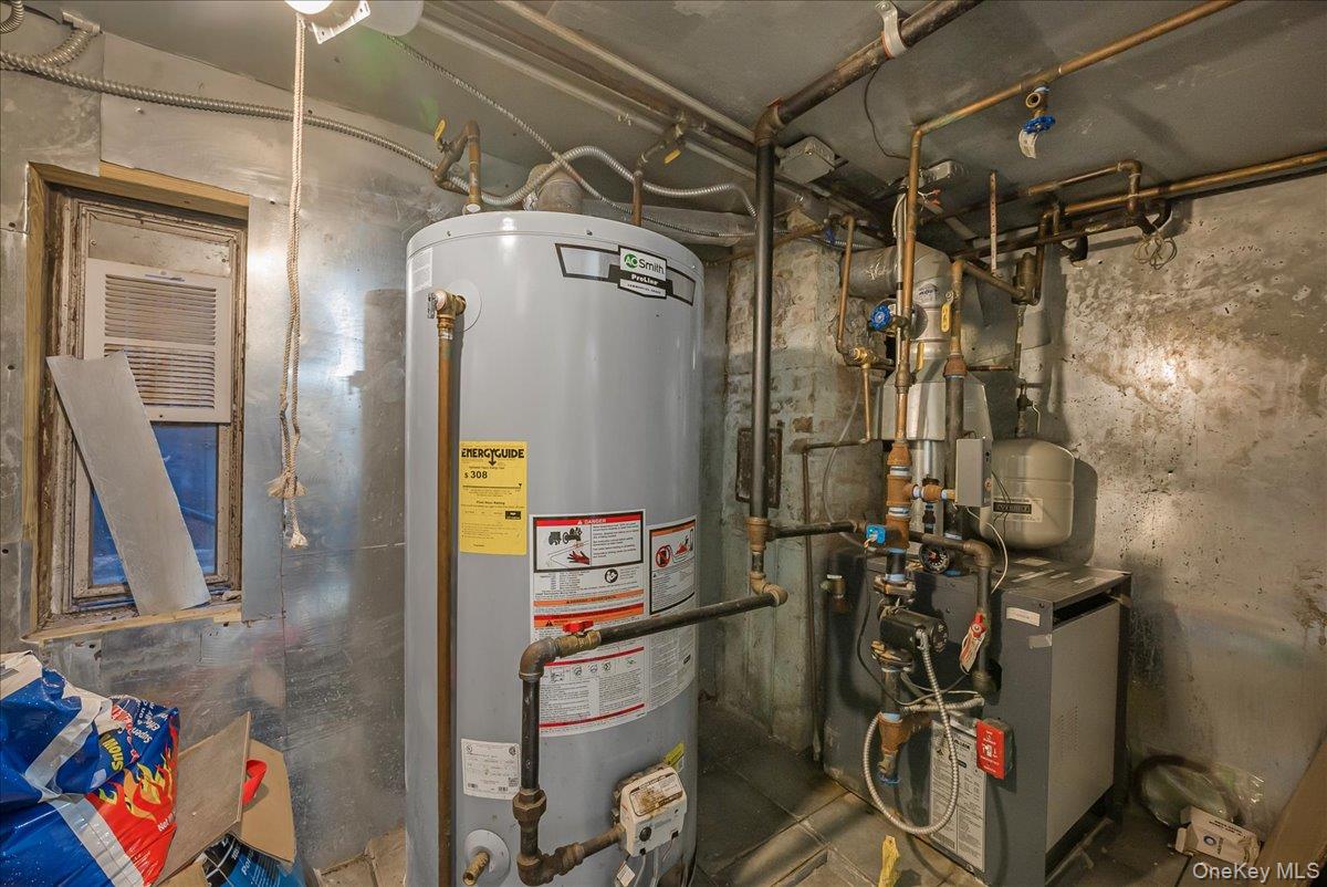 1526 Kennellworth Place Bronx, NY 10465 - Photo 11 of 37 a view of walk in closet with clothes