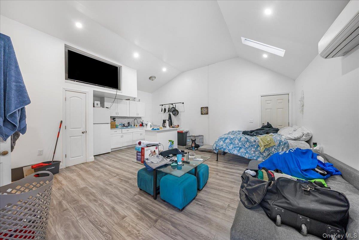 1526 Kennellworth Place Bronx, NY 10465 - Photo 21 of 37 a living room with furniture and a flat screen tv