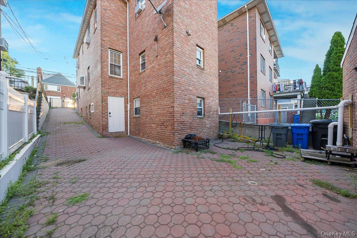 1526 Kennellworth Place Bronx, NY 10465 - Photo 22 of 37 a view of a street with cars