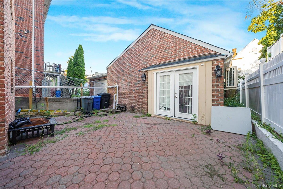 1526 Kennellworth Place Bronx, NY 10465 - Photo 23 of 37 a view of a house with backyard and sitting area