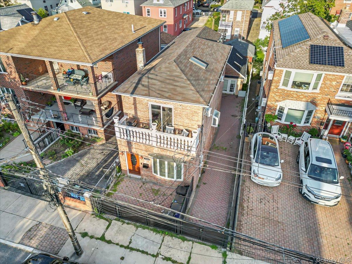 1526 Kennellworth Place Bronx, NY 10465 - Photo 3 of 37 a front view of a house with balcony