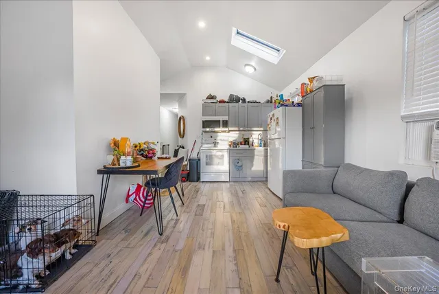 a kitchen with cabinets and appliances