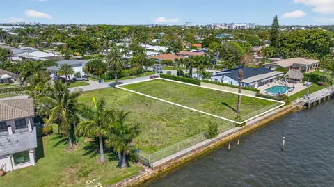 an aerial view of a house with a outdoor space