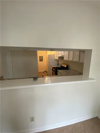 a view of a living room with a couch