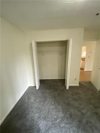 an empty room with closet