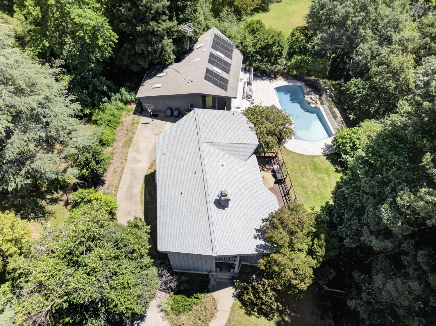 3940 Bannister Road Fair Oaks, CA 95628 - Photo 78 of 84 an aerial view of a house with a yard and large trees