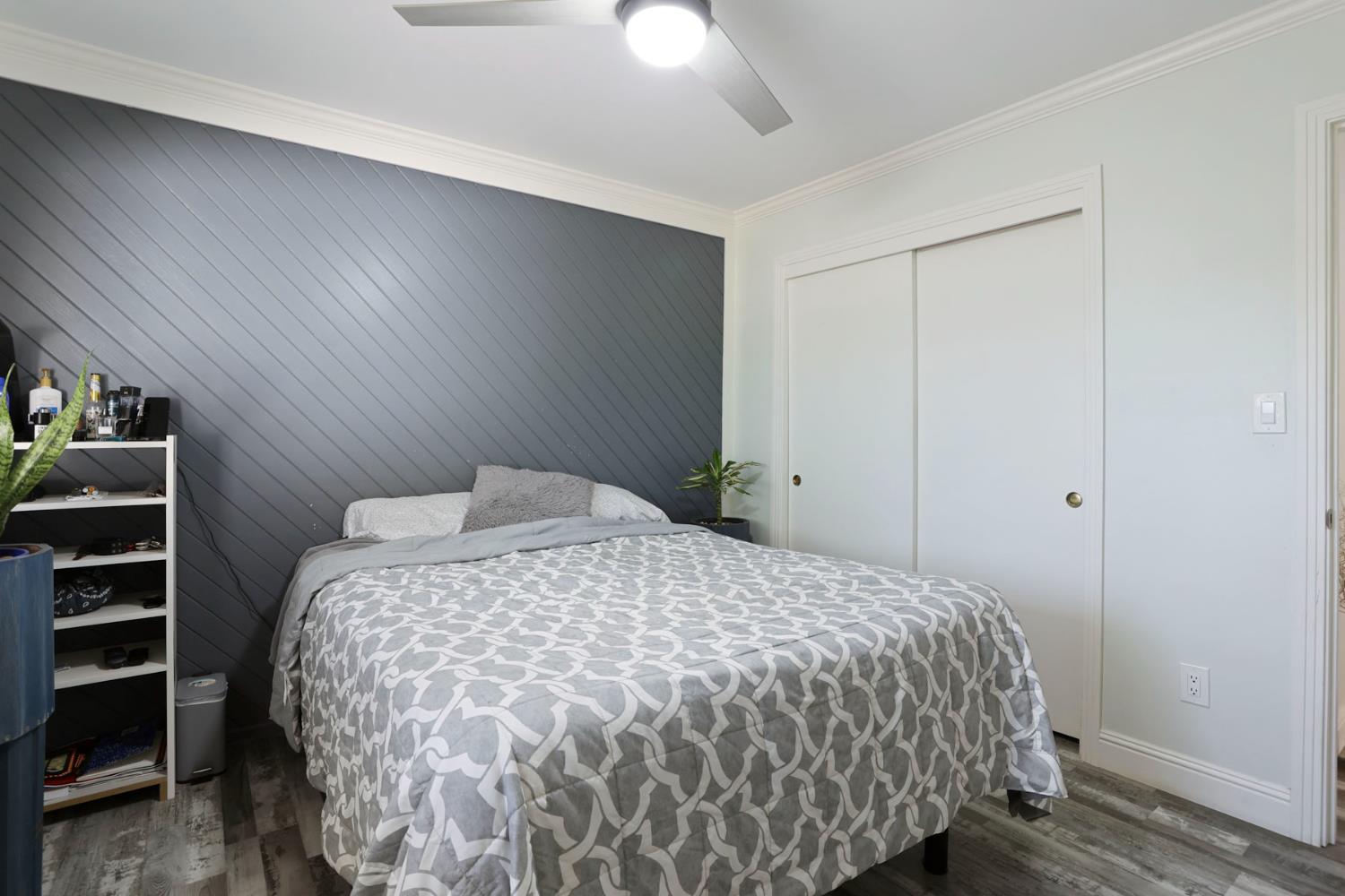 518 West Lincoln Road Stockton, CA 95207 - Photo 24 of 38 a bedroom with a bed and closet