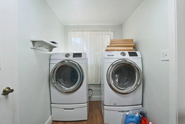 a utility room with dryer and washer