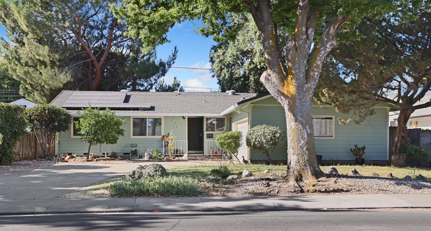 518 West Lincoln Road Stockton, CA 95207 - Photo 3 of 38 a front view of a house with a yard