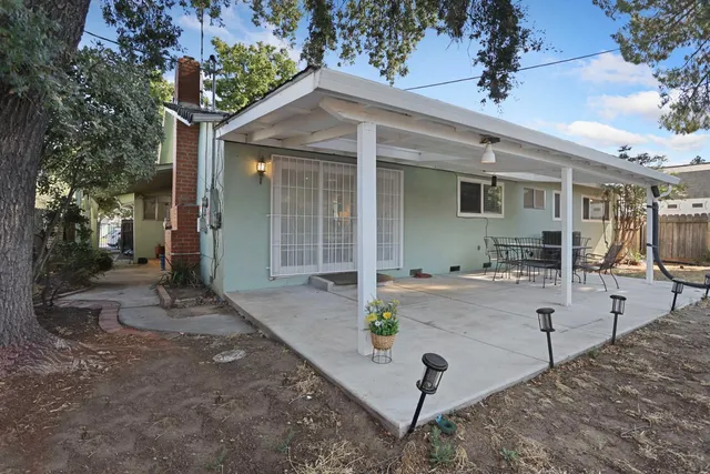 a view of a living room and kitchen