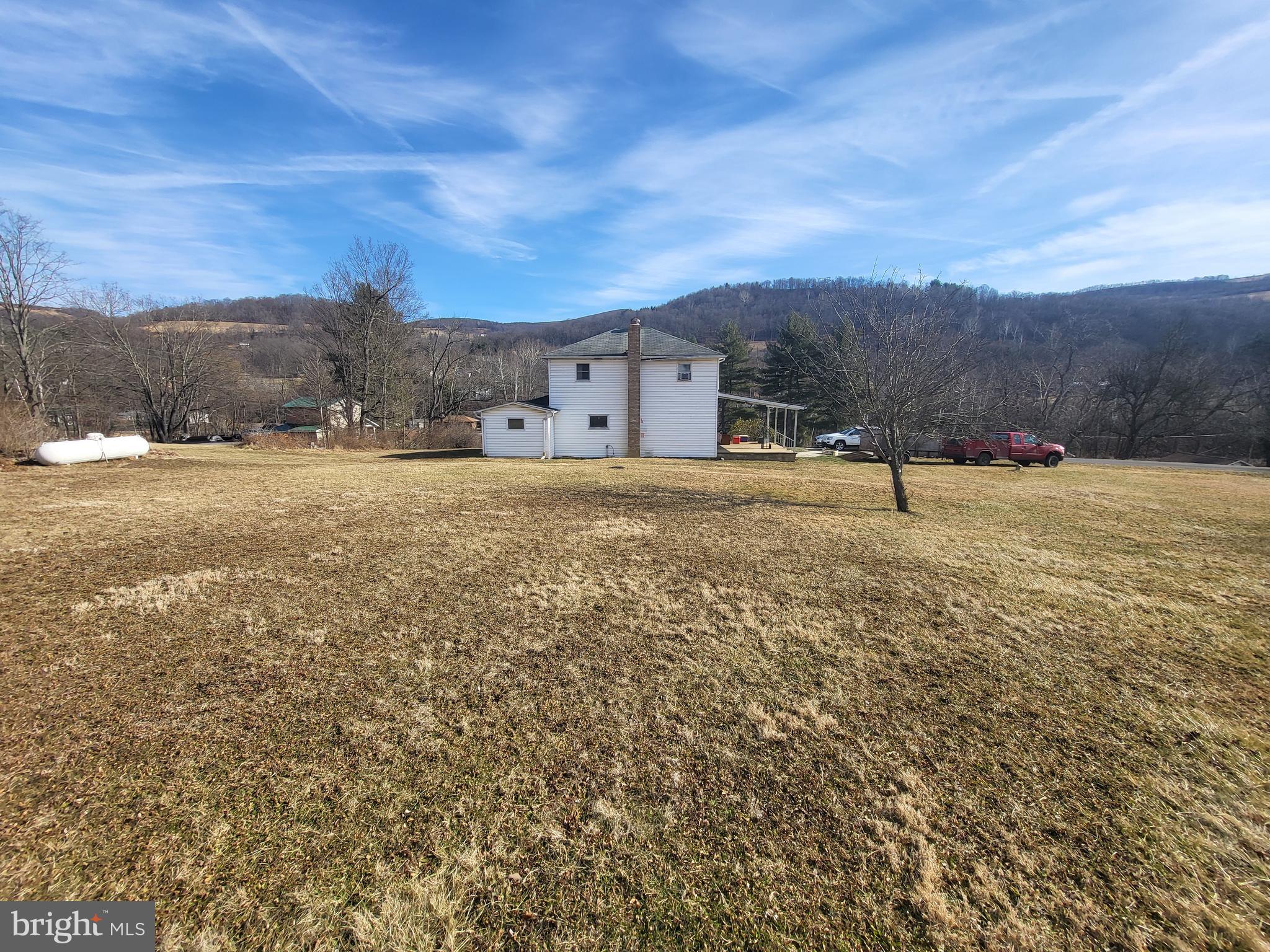 24001 Perry Hill Road Barton, MD 21521 - Photo 4 of 37 a view of large space with mountain in background