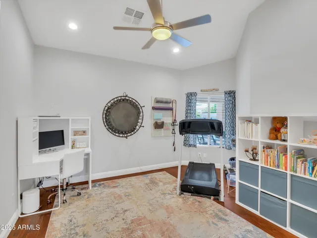 a room with furniture and a flat screen tv