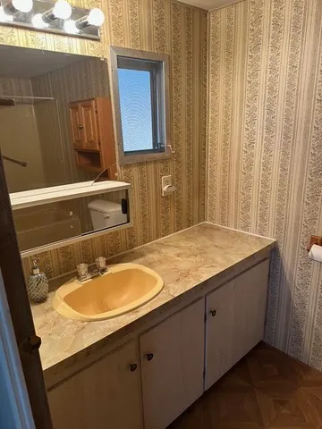 a bathroom with a shower and a bath tub