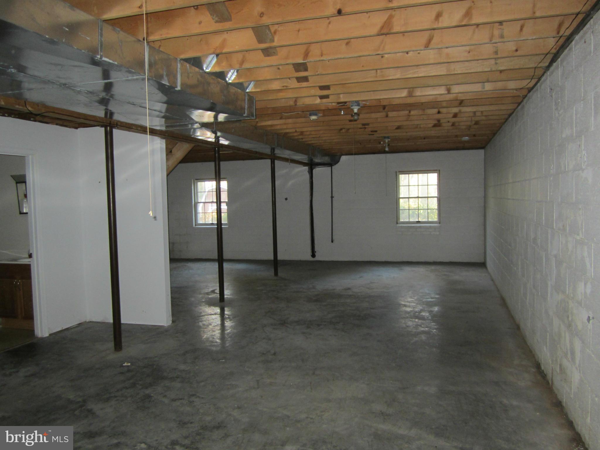 146 Calvert Towne Road Prince Frederick, MD 20678 - Photo 11 of 13 a view of a room with windows
