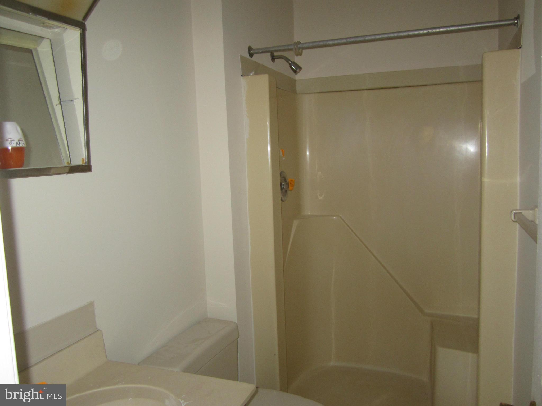 146 Calvert Towne Road Prince Frederick, MD 20678 - Photo 9 of 13 a bathroom with a shower