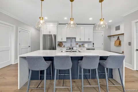 a view of a a dining room and a kitchen island