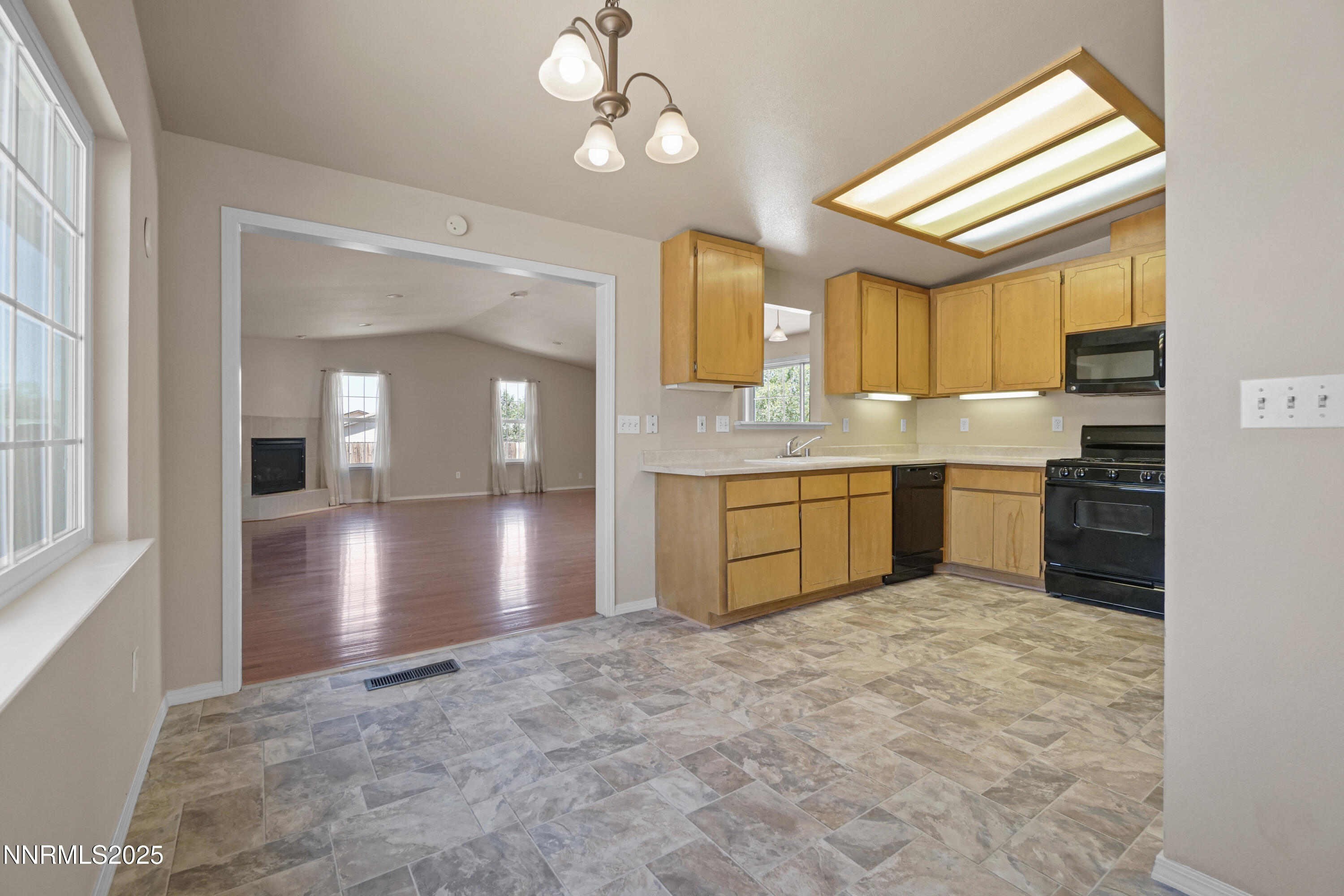 546 Yellow Jacket Road Dayton, NV 89403 - Photo 13 of 25 a view of a kitchen with a stove cabinets and a kitchen