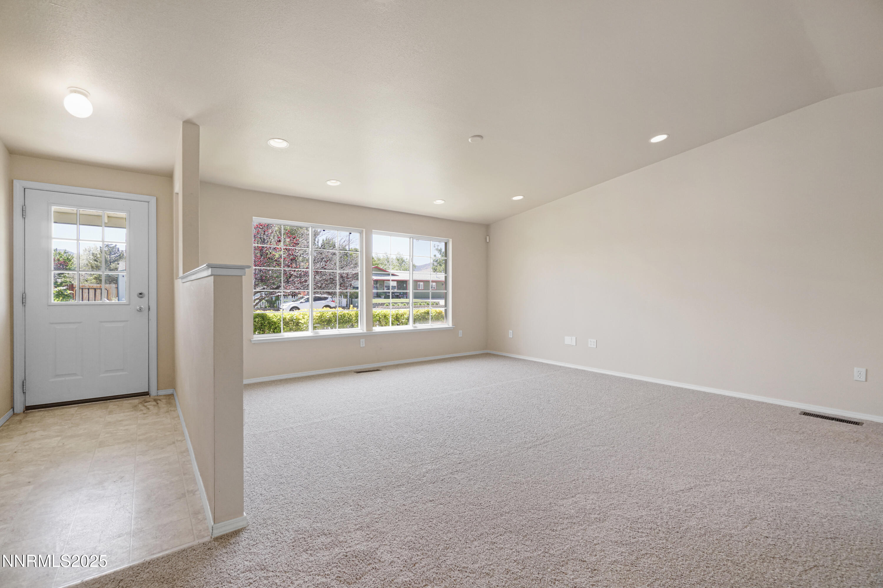 546 Yellow Jacket Road Dayton, NV 89403 - Photo 14 of 25 an empty room with windows