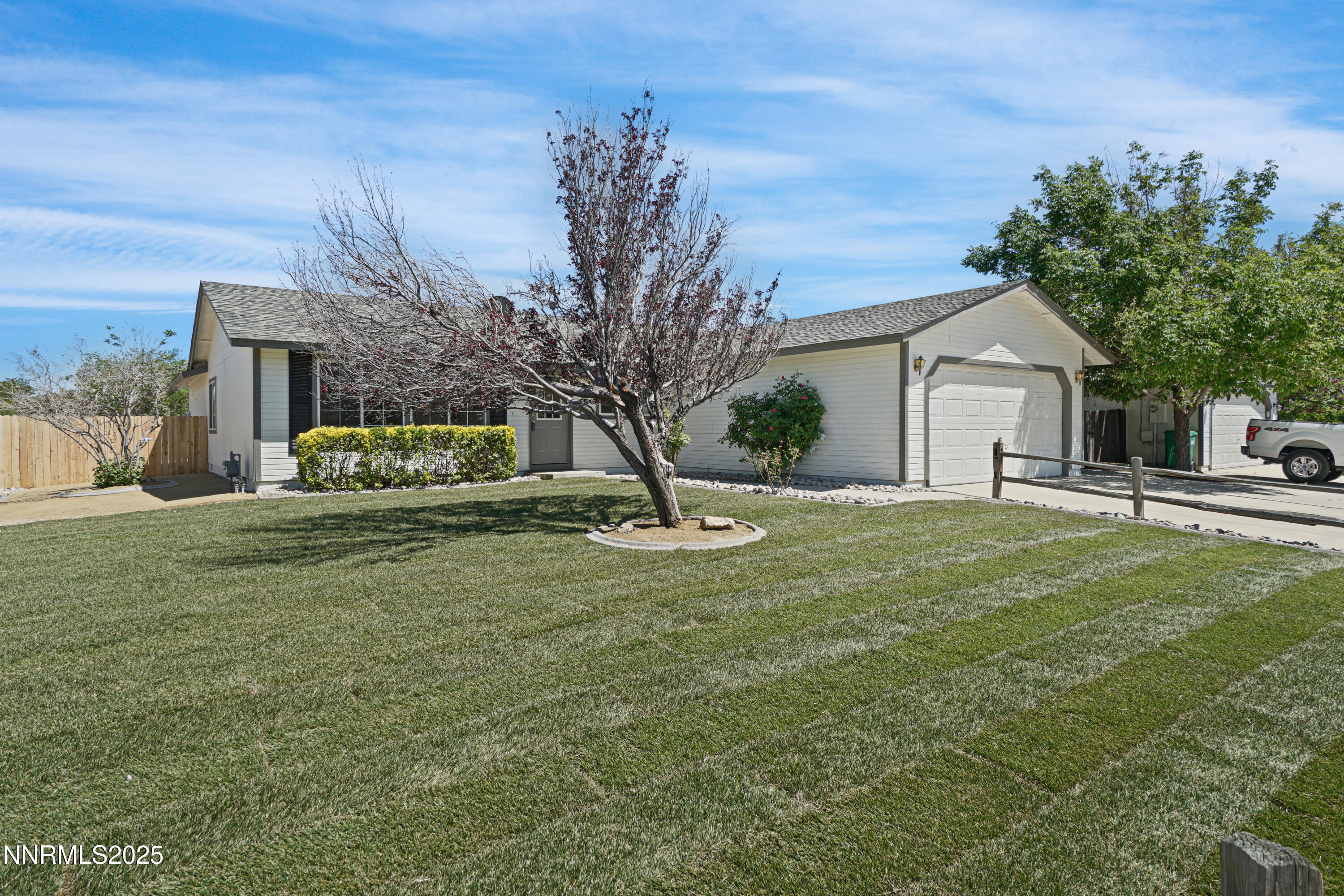 546 Yellow Jacket Road Dayton, NV 89403 - Photo 2 of 25 a view of a house with a yard