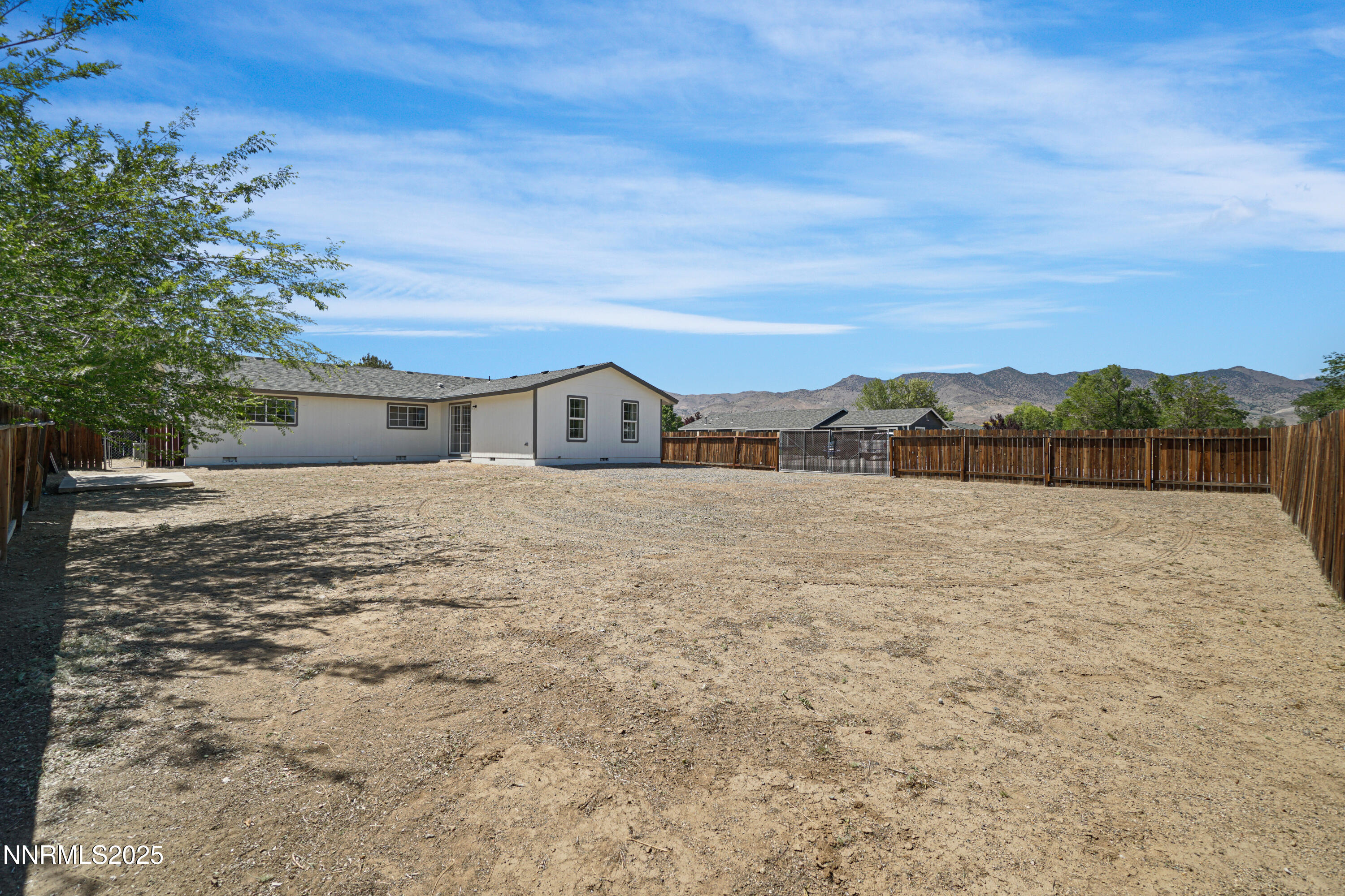 546 Yellow Jacket Road Dayton, NV 89403 - Photo 24 of 25 a view of large yard with large trees