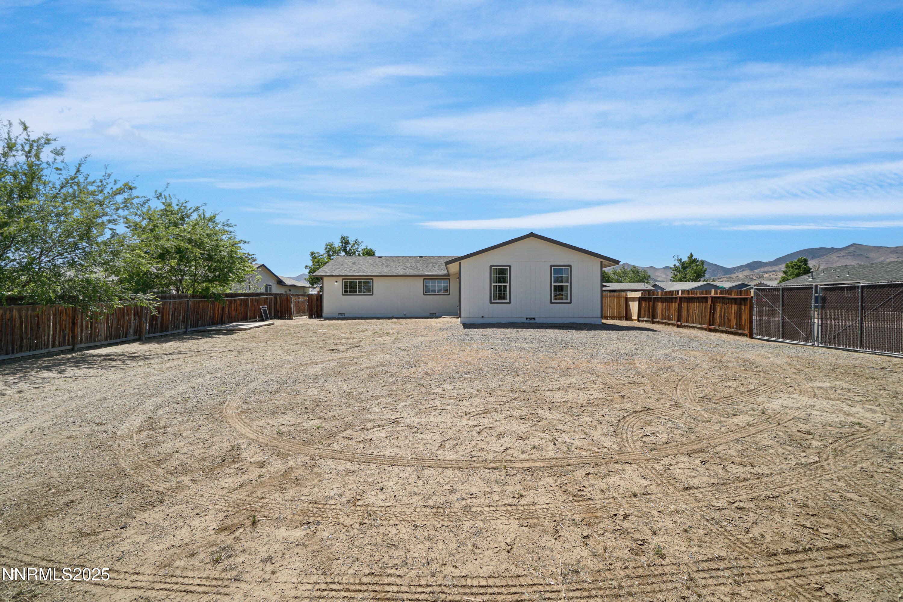 546 Yellow Jacket Road Dayton, NV 89403 - Photo 25 of 25 a view of house with backyard