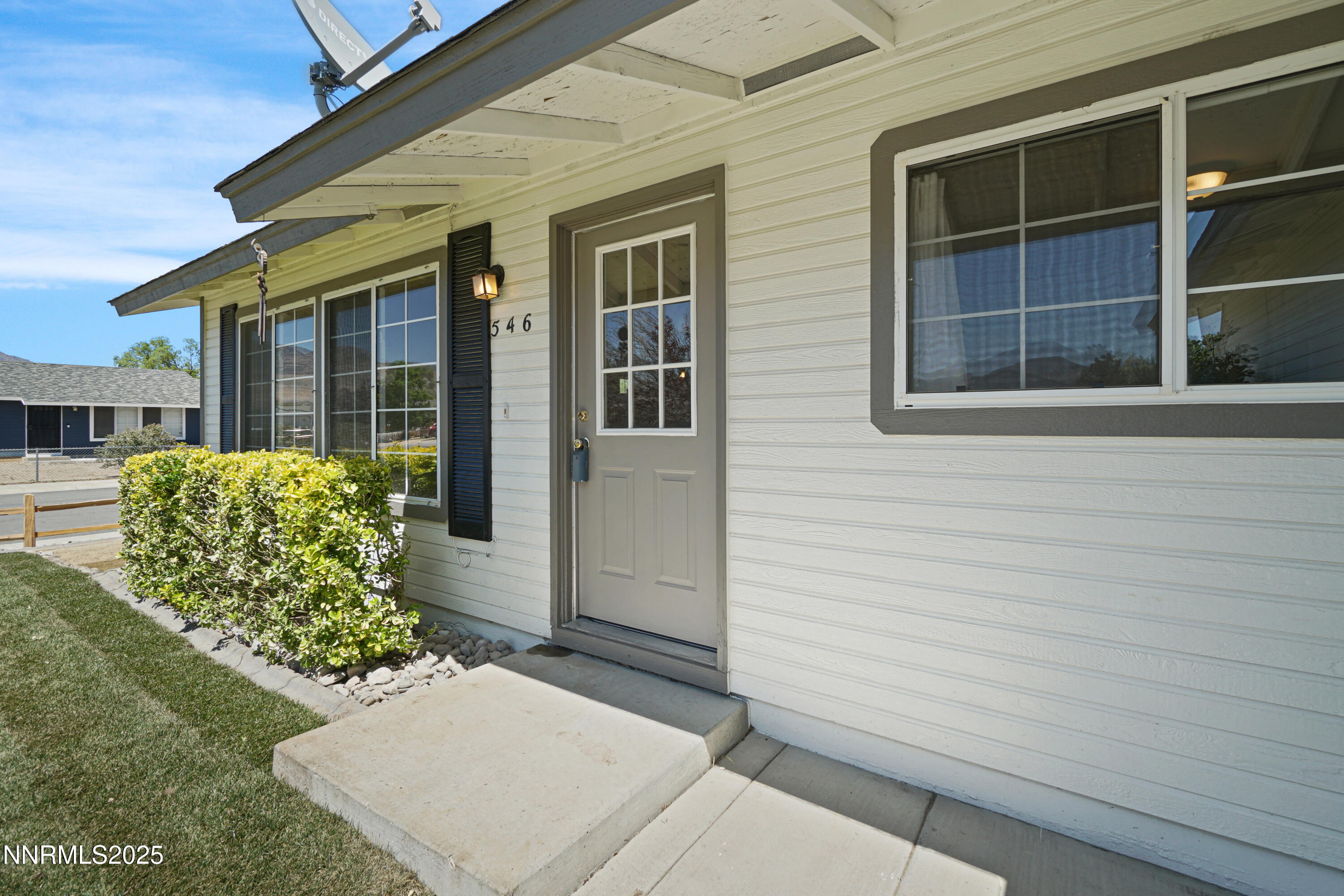 546 Yellow Jacket Road Dayton, NV 89403 - Photo 4 of 25 a view of a house with a door