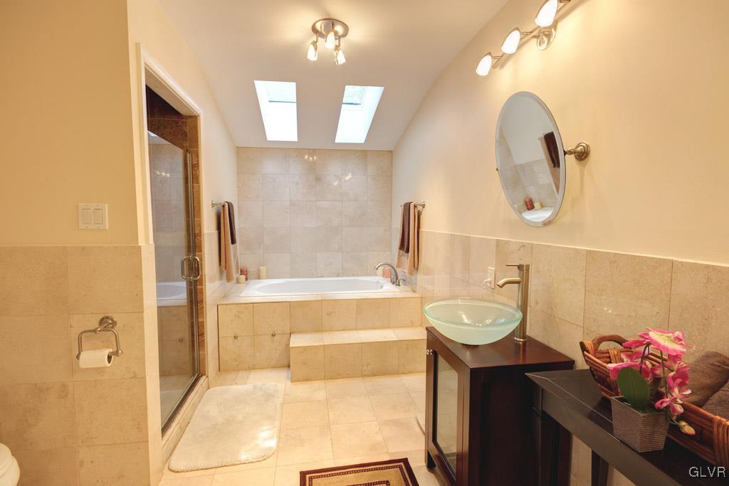 2270 Bishop Road Allentown, PA 18103 - Photo 16 of 33 a bathroom with a sink mirror and vanity