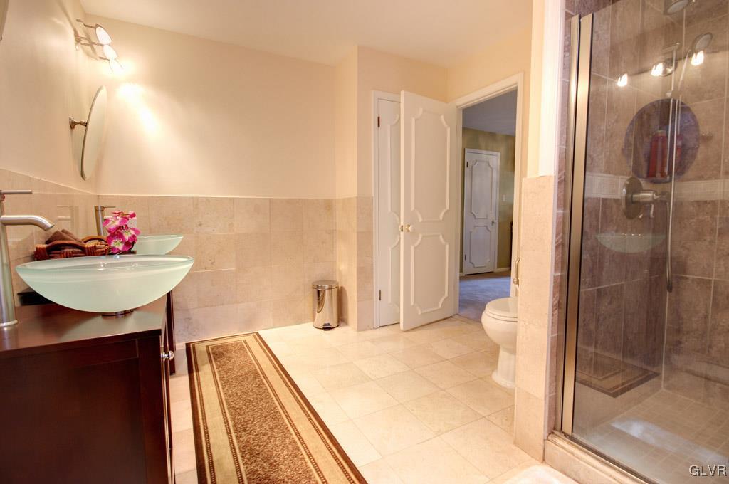 2270 Bishop Road Allentown, PA 18103 - Photo 18 of 33 a bathroom with a sink and a mirror