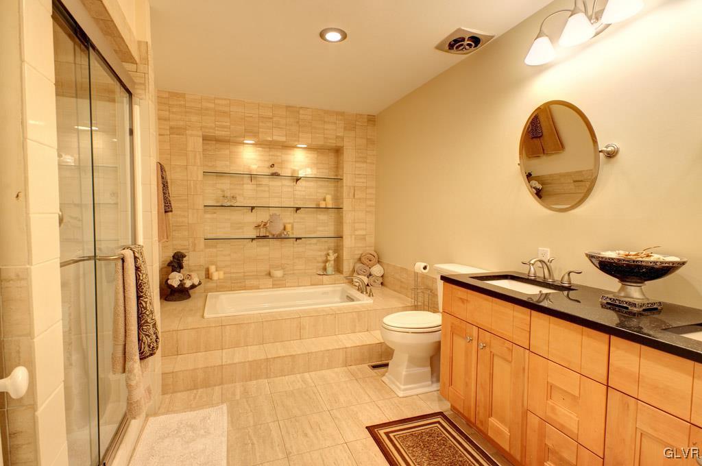 2270 Bishop Road Allentown, PA 18103 - Photo 23 of 33 a bathroom with a sink a toilet and shower