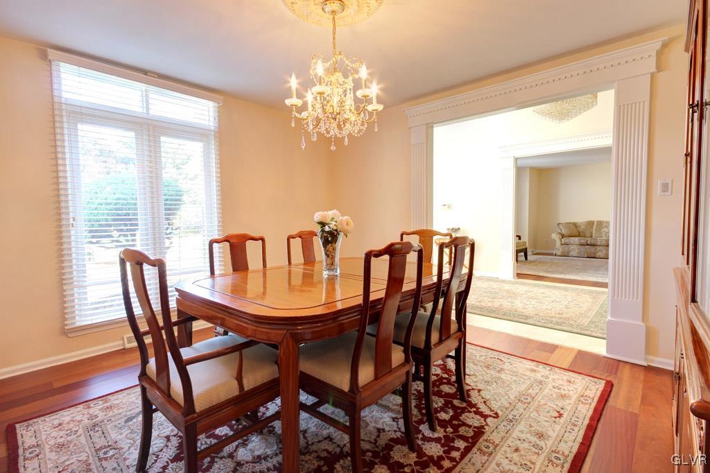 2270 Bishop Road Allentown, PA 18103 - Photo 6 of 33 a view of a dining room with furniture wooden floor and chandelier