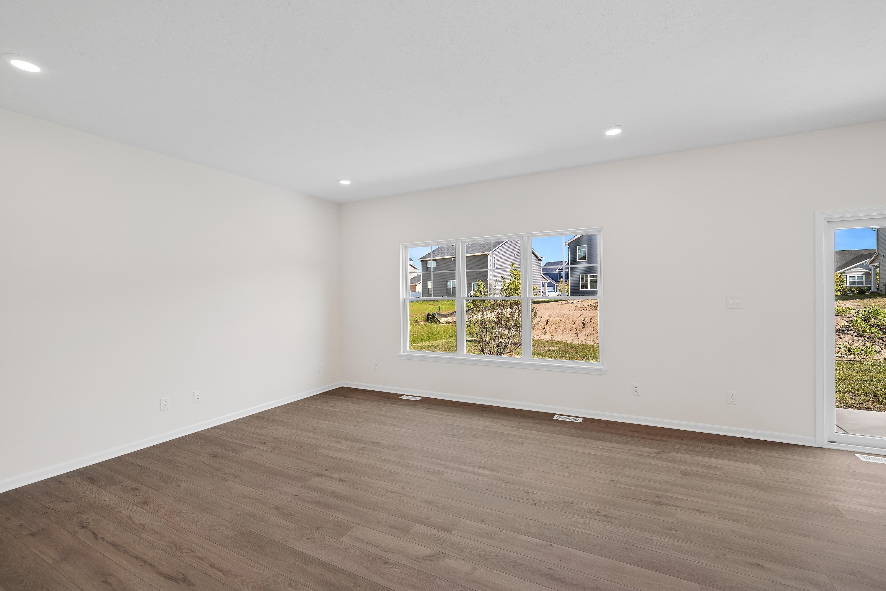 3758 Wild Grove Way Valparaiso, IN 46385 - Photo 3 of 19 an empty room with windows
