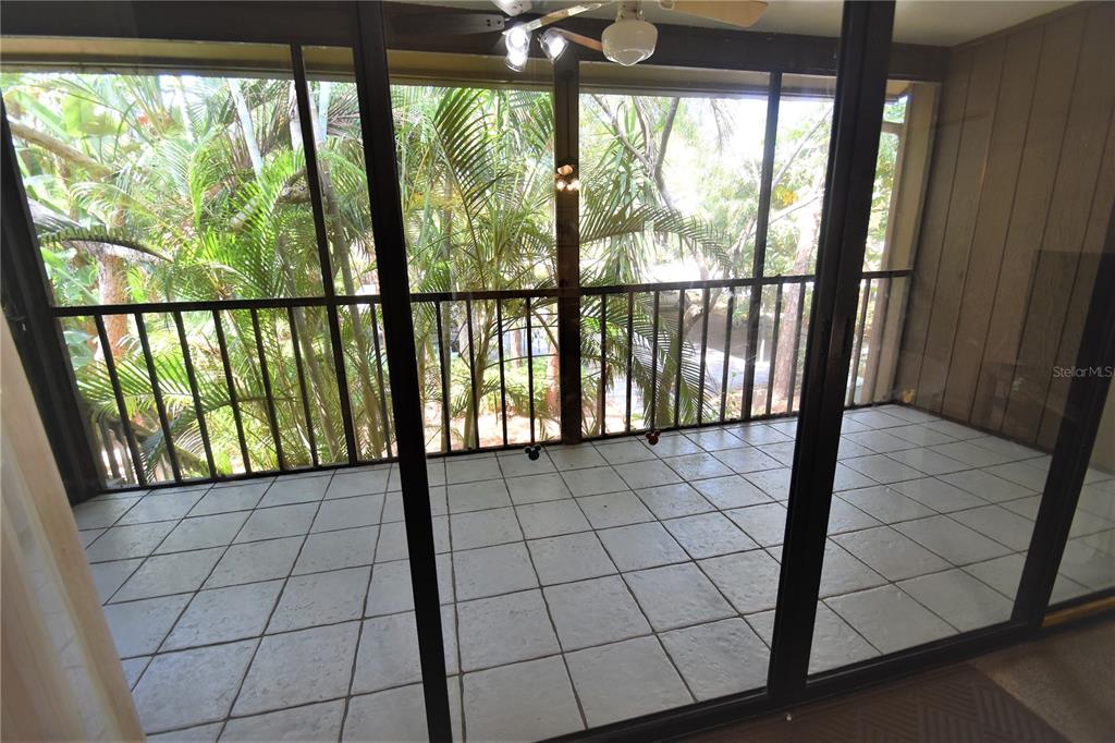 1712 Glenhouse Drive, Unit GL418 Sarasota, FL 34231 - Photo 2 of 37 a view of a black gate of an outdoor space