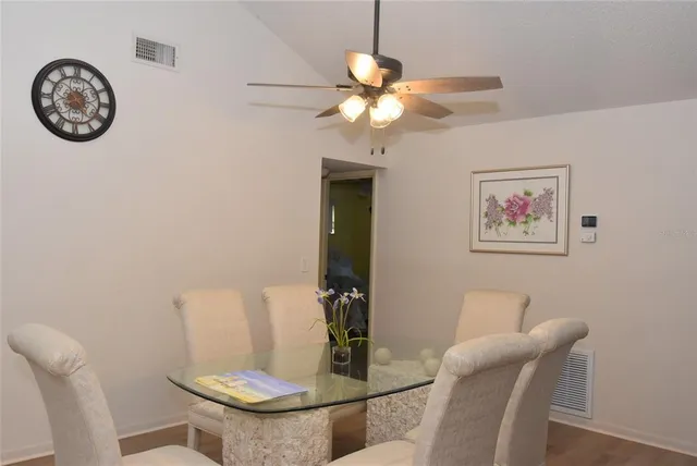 a view of a dining room with furniture