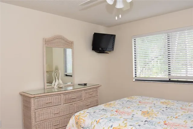 a bathroom with a tub and a mirror